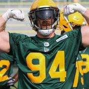 Edmonton Elks defensive tackle Jake Ceresna flexes for the camera during training camp on Thursday, July 15, 2021.