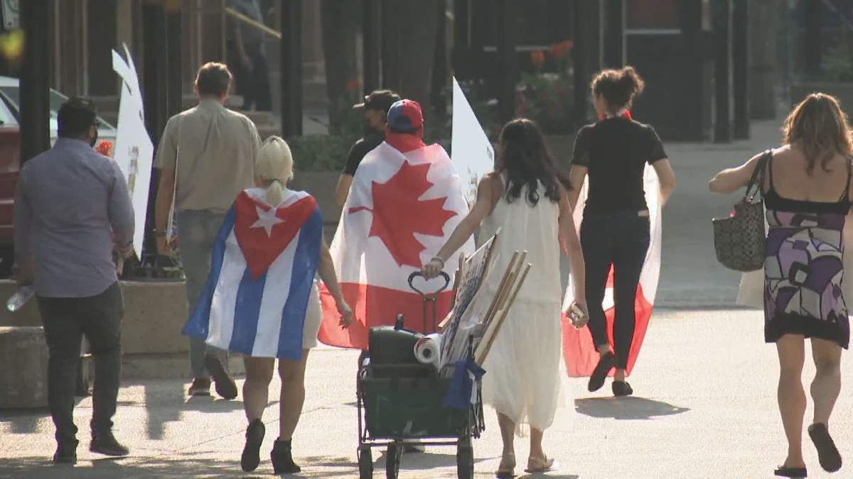 Calgarians with Cuban ties rallied in support of their family and friends back home July 23, 2021.
