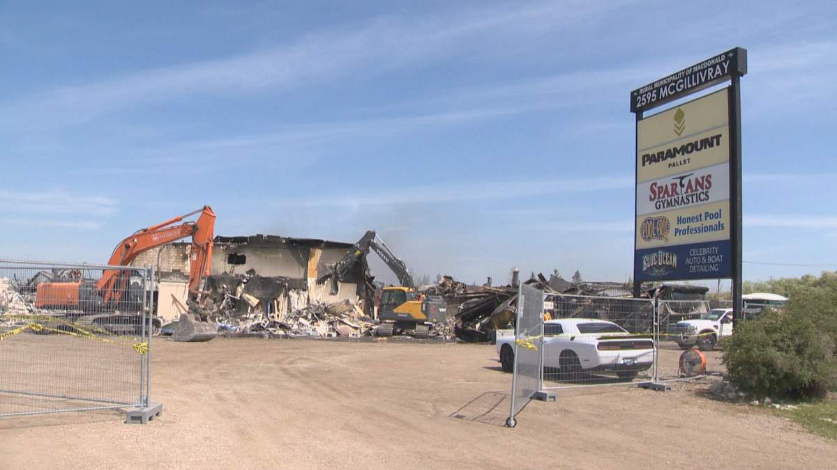 Crews continued efforts to extinguish a fire in the 2500 block of McGillivray Blvd. Saturday, nearly two days after it originally sprang up.