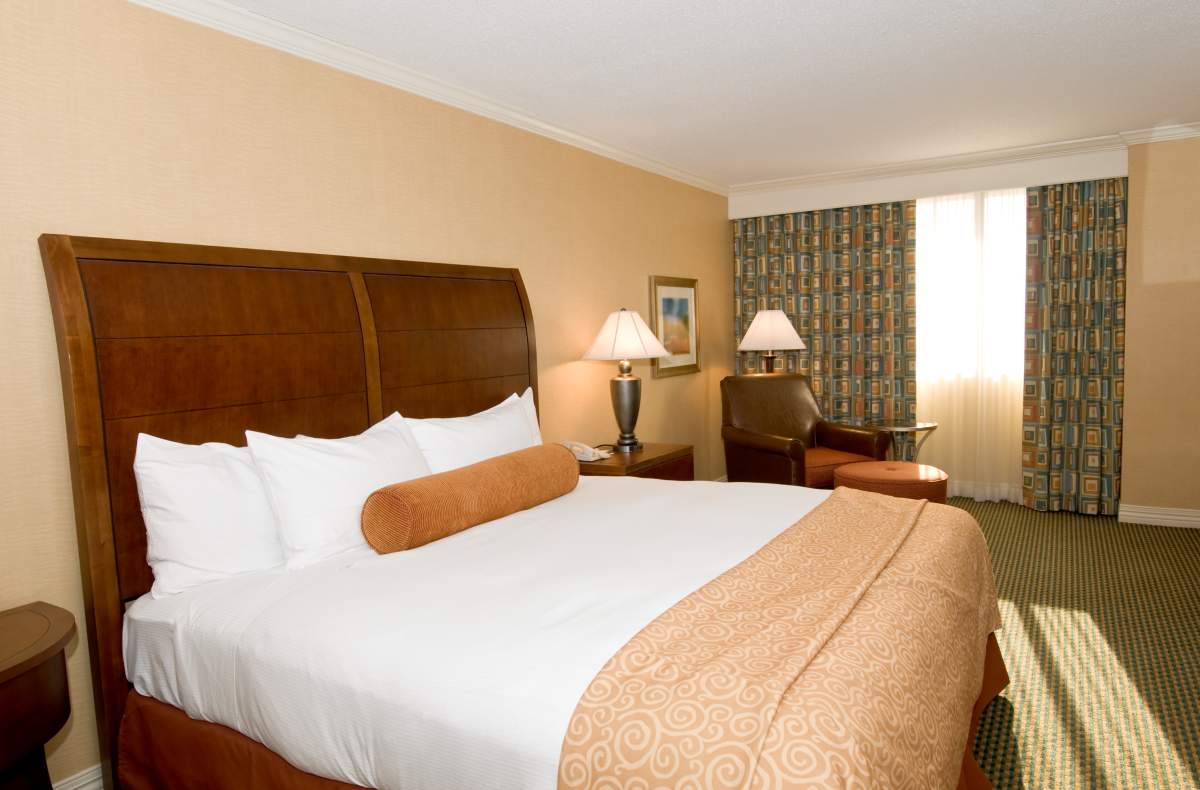 FILE - Hotel room with queen bed. 