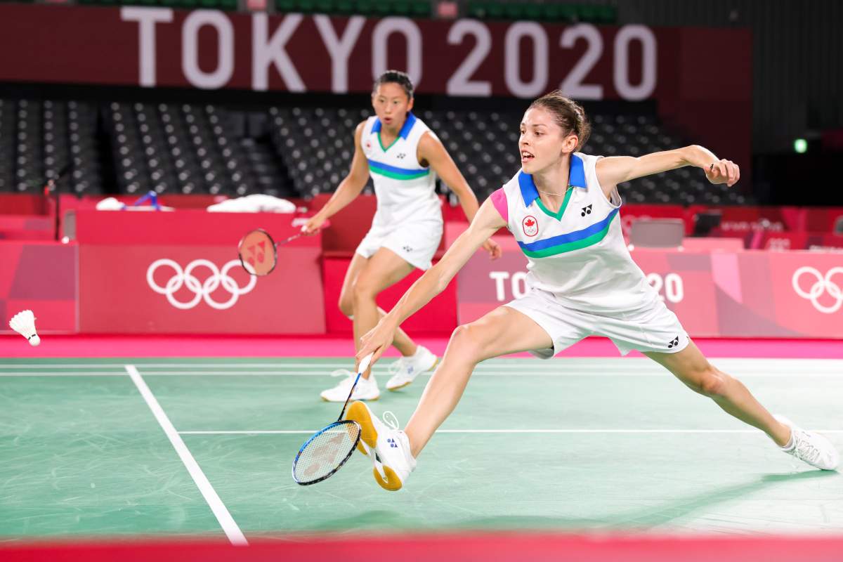 Rachel Honderich (front) and Kristen Tsai of Team Canada compete against Mayu Matsumoto and Wakana Nagahara of Team Japan during a Women\’s Doubles Group B match on day two of the Tokyo 2020 Olympic Games at Musashino Forest Sport Plaza on July 25, 2021 in Chofu, Tokyo, Japan.