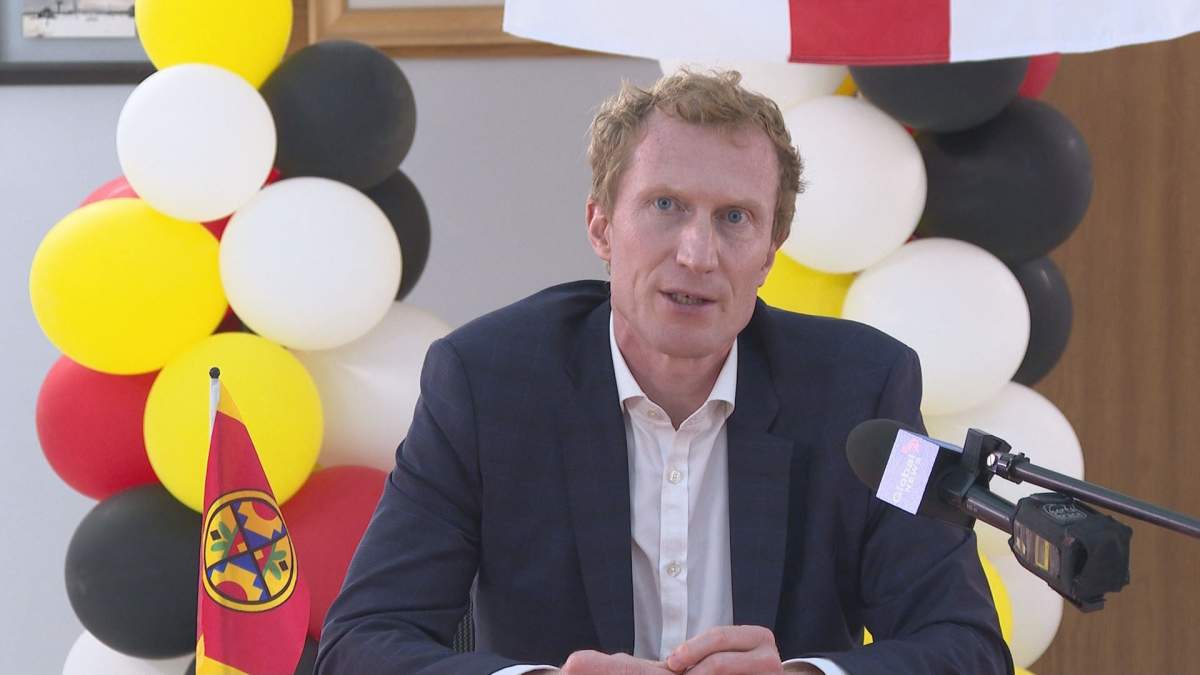 Indigenous Services Minister Marc Miller speaks to reporters after announcing Ottawa’s contribution to an emergency shelter on the Natoaganeg First Nation