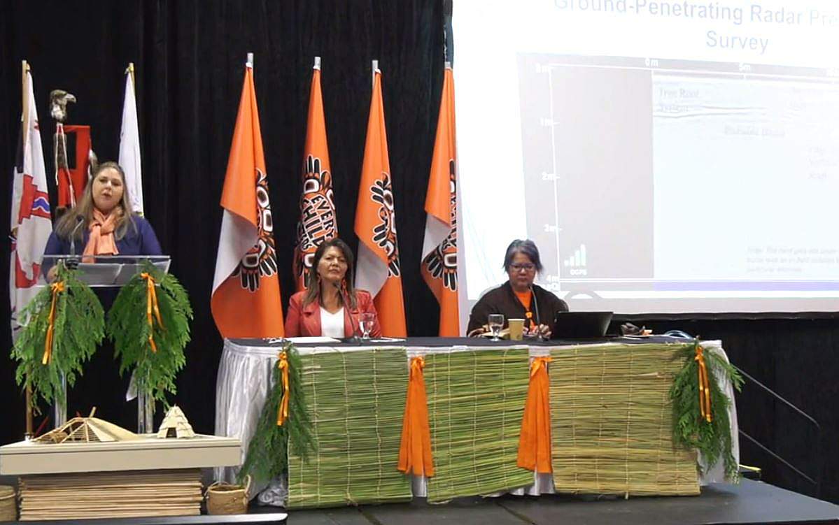 Sarah Beaulieu, a ground-penetrating radar specialist from the University of Fraser Valley, left, speaks during a news conference in Kamloops, B.C., on Thursday morning.