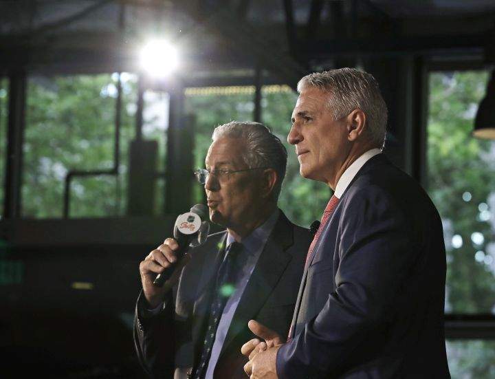 Ron Francis, right, and Seattle Hockey Partners CEO Tod Leiweke, left, take questions from reporters, Thursday, July 18, 2019, during a news conference in Seattle to introduce Francis as the first general manager for Seattle’s yet-to-be-named NHL expansion team.