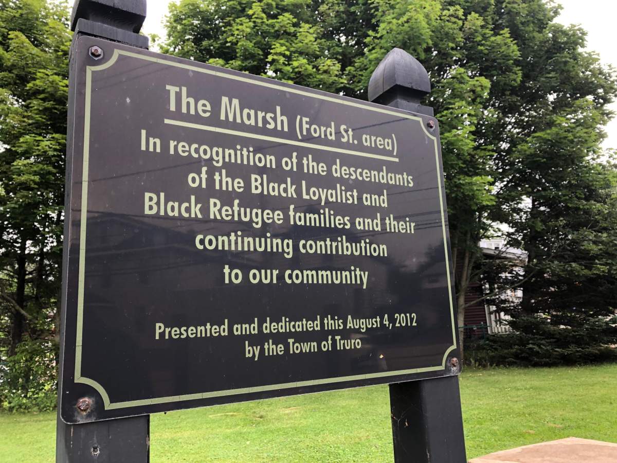The defaced sign was near a sign honouring the descendants of Black Loyalists and refugees.