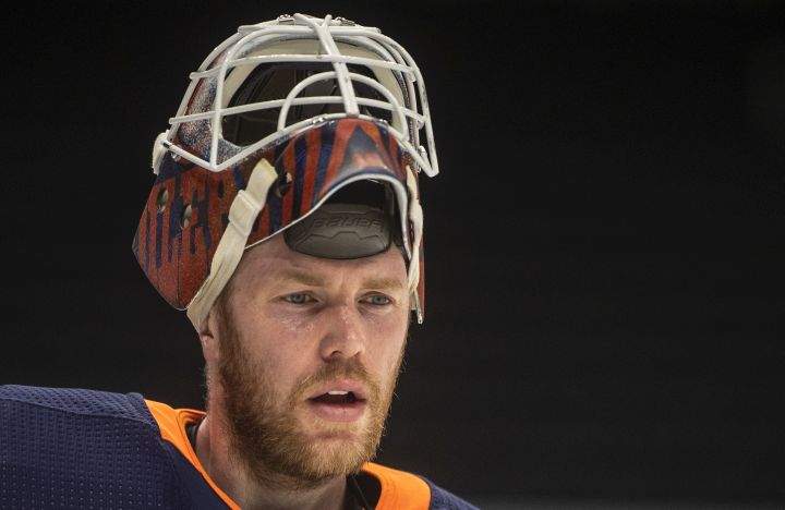 Edmonton Oilers goalie Mikko Koskinen (19) skates during a break in action against the Vancouver Canucks during third period NHL action in Edmonton on Saturday, May 15, 2021.