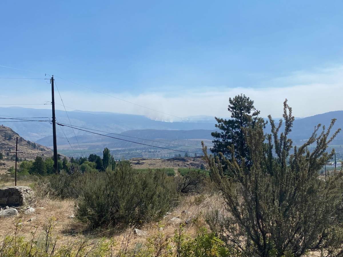 The Nk’Mip Creek wildfire was pictured from Oliver, B.C., on Monday, July 26, 2021.