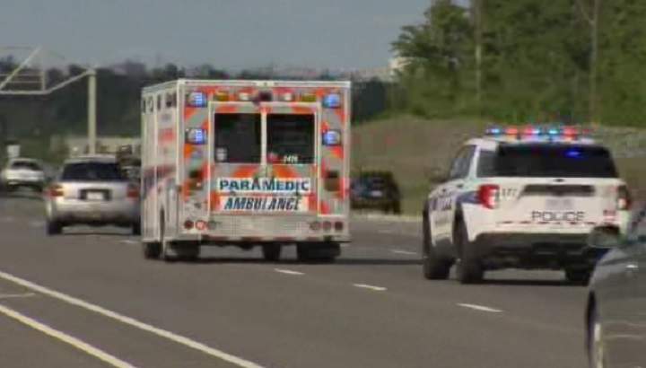 Peel Paramedics take a patient to a hospital with a police escort Friday afternoon.