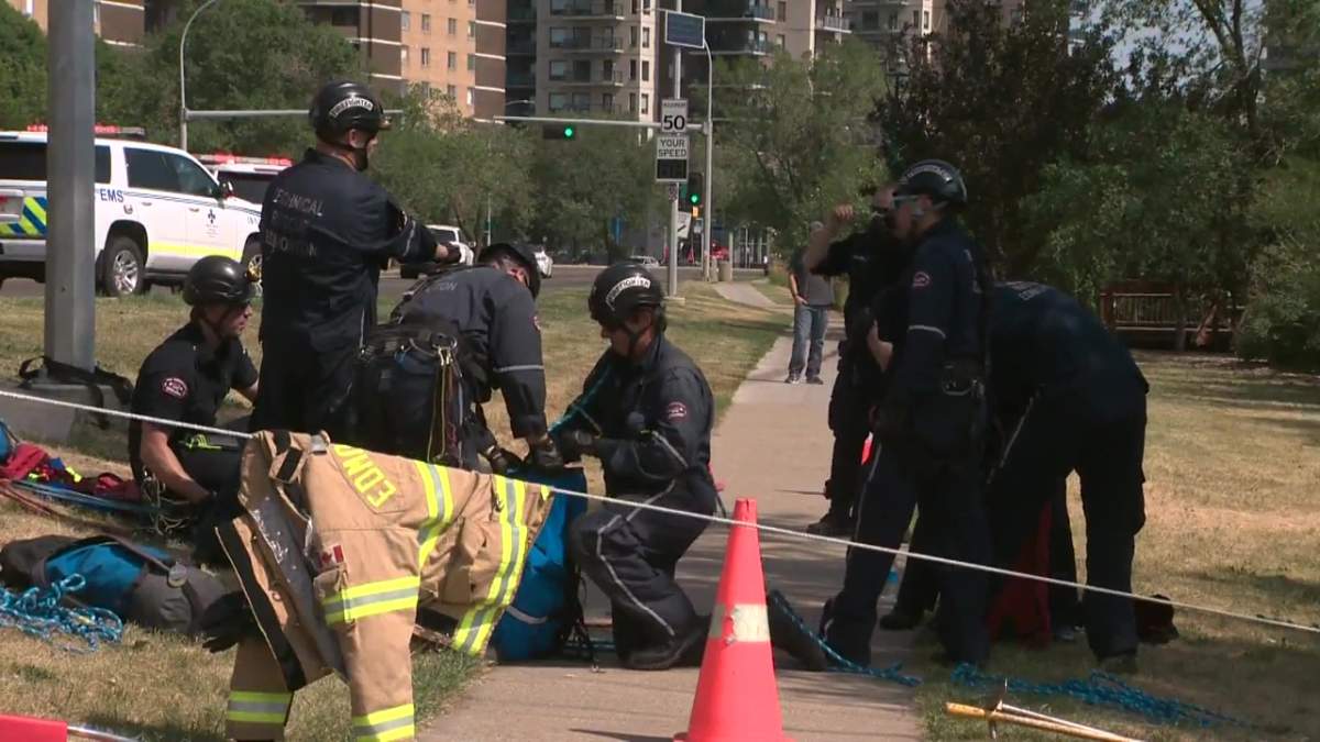 Edmonton emergency crews responded to Jasper Avenue near 90 Street, where a vehicle veering off the road and crashed into the North Saskatchewan River valley on Tuesday, July 13, 2021.