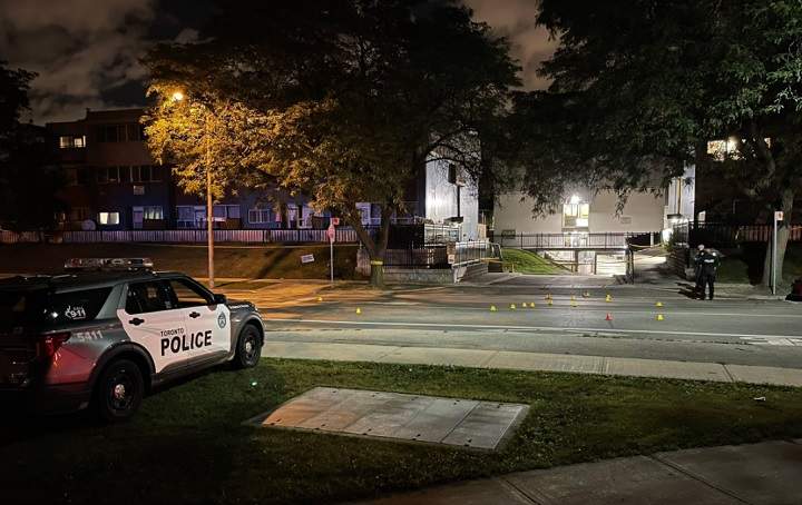 Officers block off a large section of Vendome Place and Grenoble Drive early Friday.
