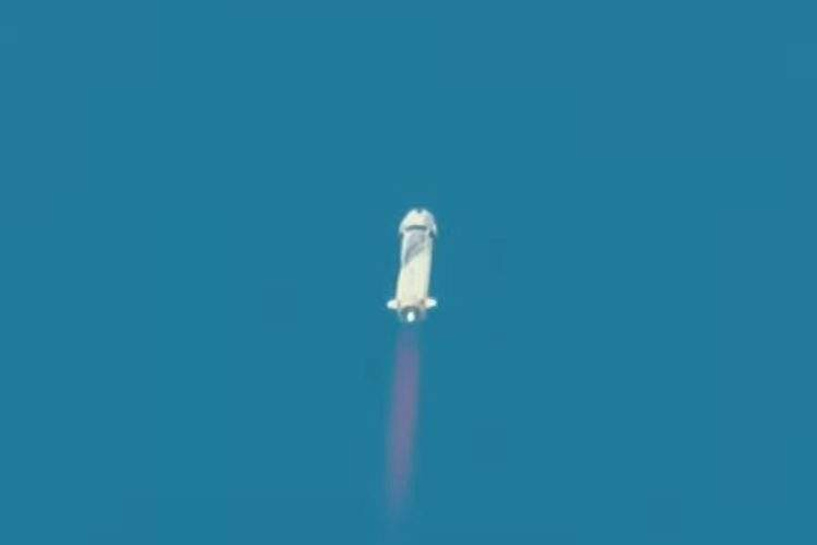 Blue Origin’s New Shepard flies into space from the launch pad carrying Jeff Bezos along with his brother Mark Bezos, 18-year-old Oliver Daemen, and 82-year-old Wally Funk on July 20, 2021 in Van Horn, Texas.