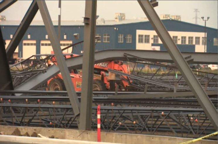 Some equipment was crushed under steel beams after a windy evening in Edmonton on July 21, 2021.