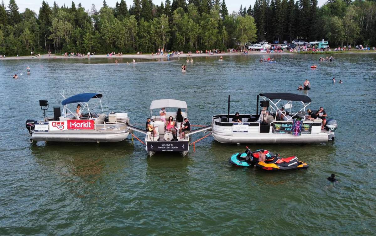 Performers at a Gator’s Waterfest concert on Candle Lake in Saskatchewan.