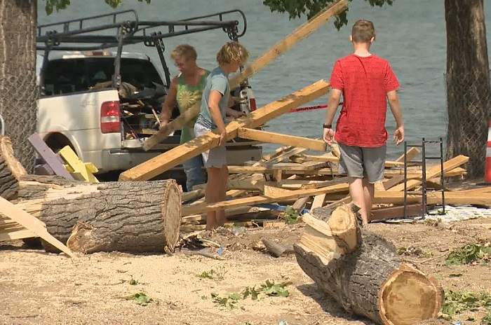 Regina Beach residents pitched in on clean-up efforts throughout the community on Monday morning following a storm on Sunday night.