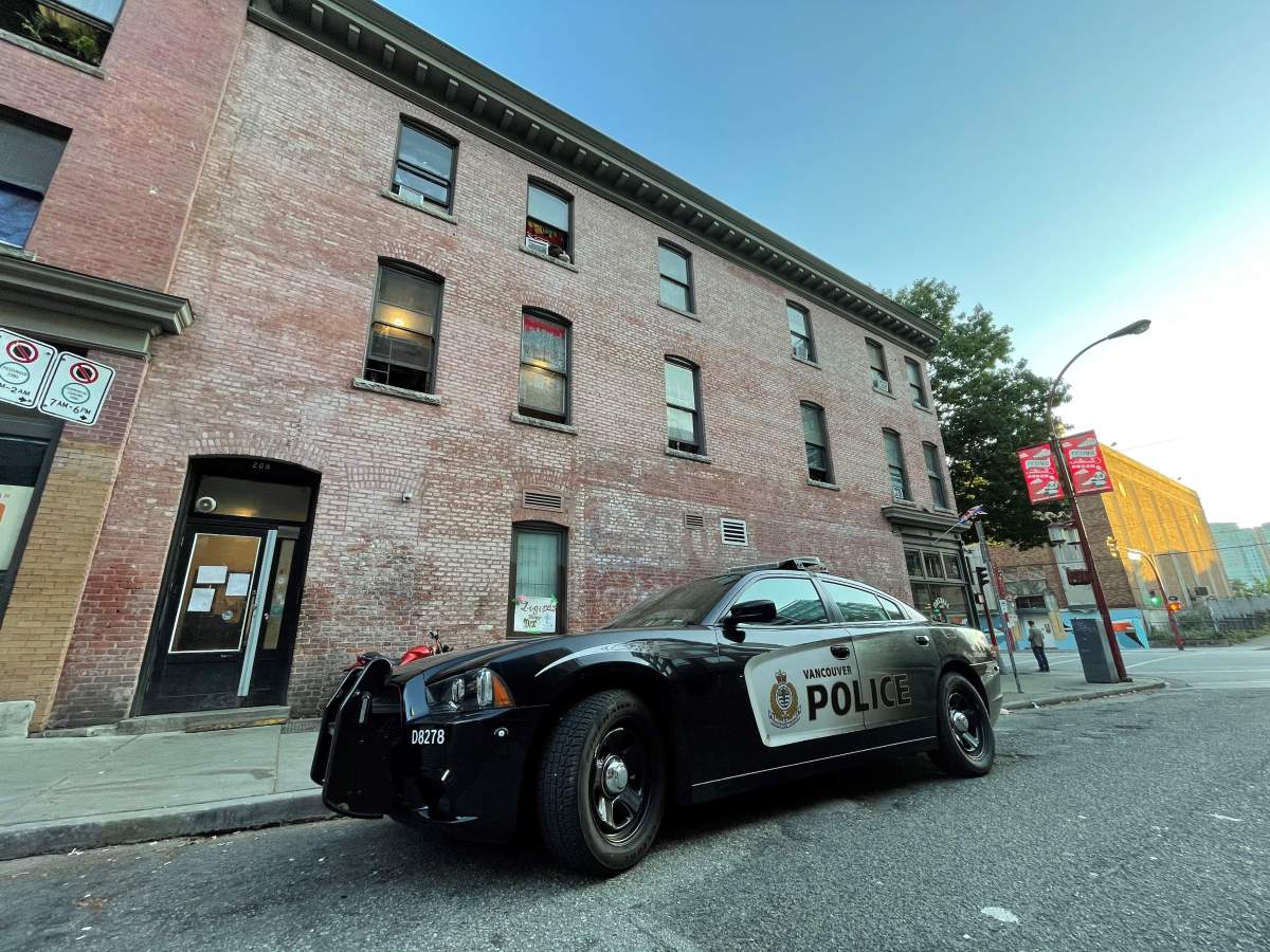 Vancouver police outside the London Hotel in the Strathcona neighbourhood of Vancouver on July 20, 2021. Police are investigating a fatal shooting that occurred inside the hotel Tuesday morning.
