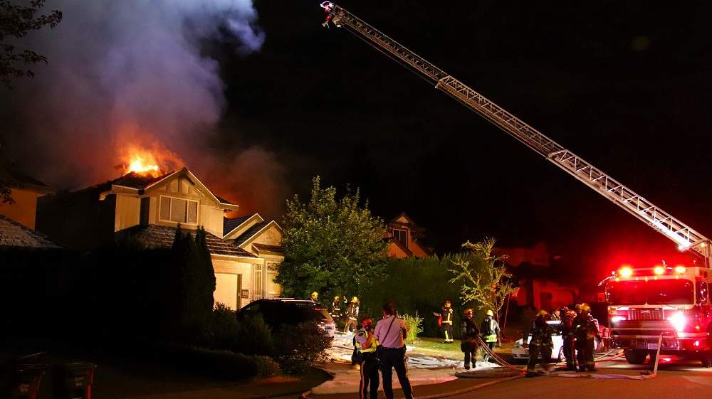 Crews battled a fire in Surrey on July 8, 2021.