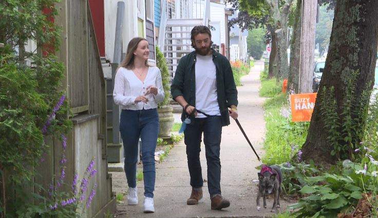 Amy Mielke and Patrick Jerrette walk their dog in Halifax’s North End.