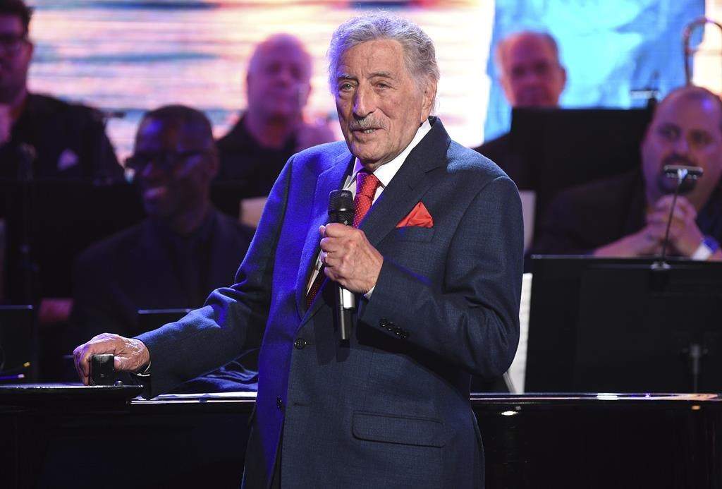 FILE - Tony Bennett performs at the Statue of Liberty Museum opening celebration on May 15, 2019, in New York.