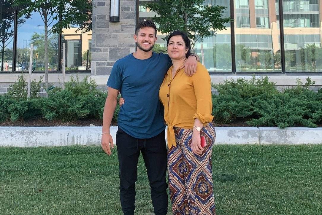 Seyar Karimi and his mother Gulmakai are seen in this undated photo. Karimi has been working for days to try and get his mother out of Afghanistan.