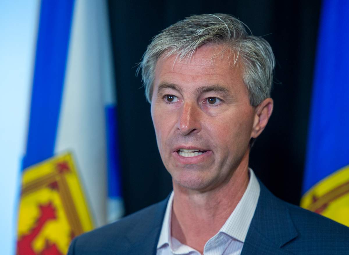 Nova Scotia Progressive Conservative leader Tim Houston announces a program that would reward shoppers for by participating local products at a campaign event in Halifax on Tuesday, July 20, 2021. 