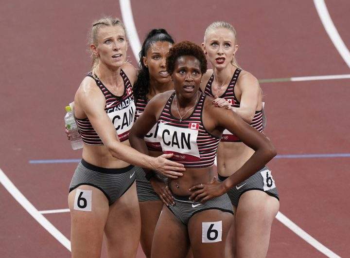 Canada’s Maddy Price (left), Alicia Brown, Kyra Constantine and Sage Watson (right) wait for their results in the women’s 4 x 400m relay race heat at the 2020 Tokyo Olympics, Thursday, August 5, 2021 in Tokyo, Japan.