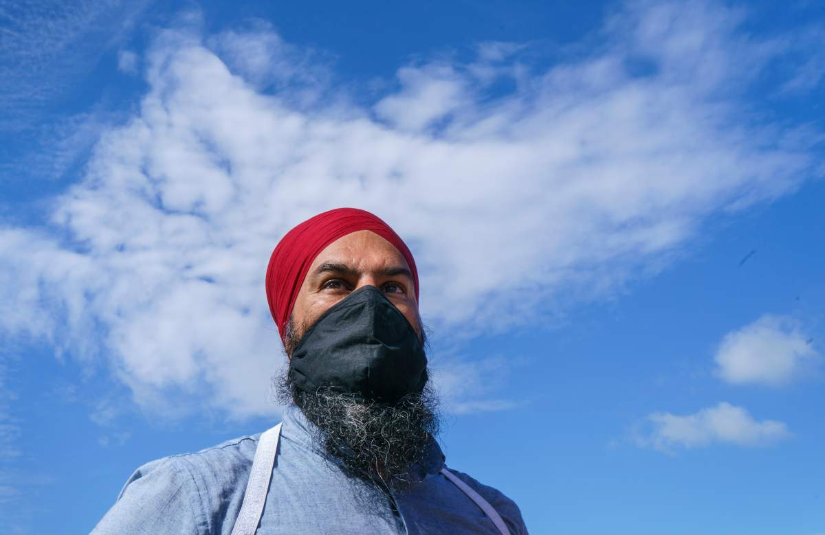 NDP leader Jagmeet Singh walks along the waterfront in Windsor, Ont. on Wednesday, August 25, 2021. 