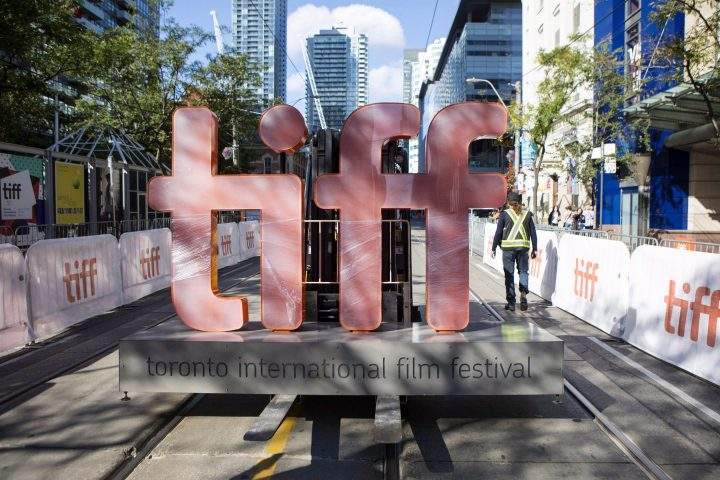 A sign bearing the Toronto International Film Festival logo is carried on a fork lift in downtown Toronto on Thursday September 7, 2017.