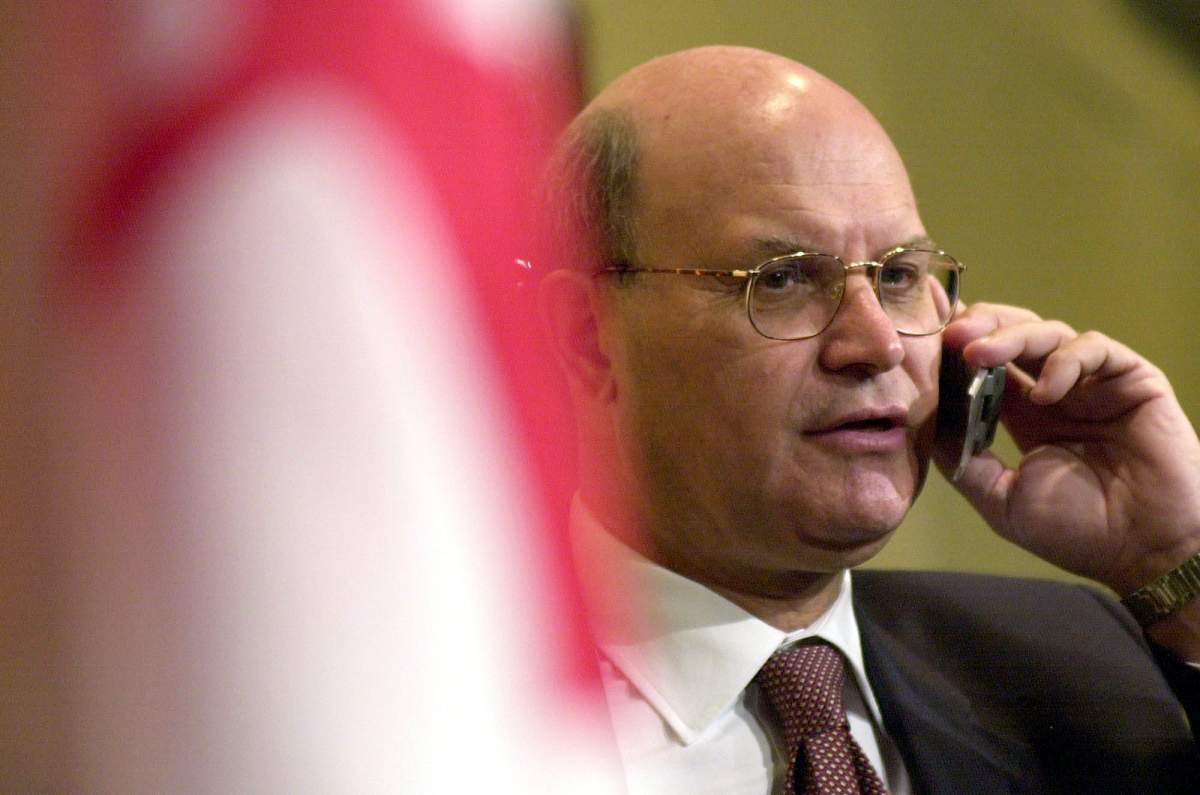 Former transport minister David Collenette, shown here in Montreal speaking on a cellphone just after the terrorist attacks on the United States, on Tuesday, Sept. 11, 2001.