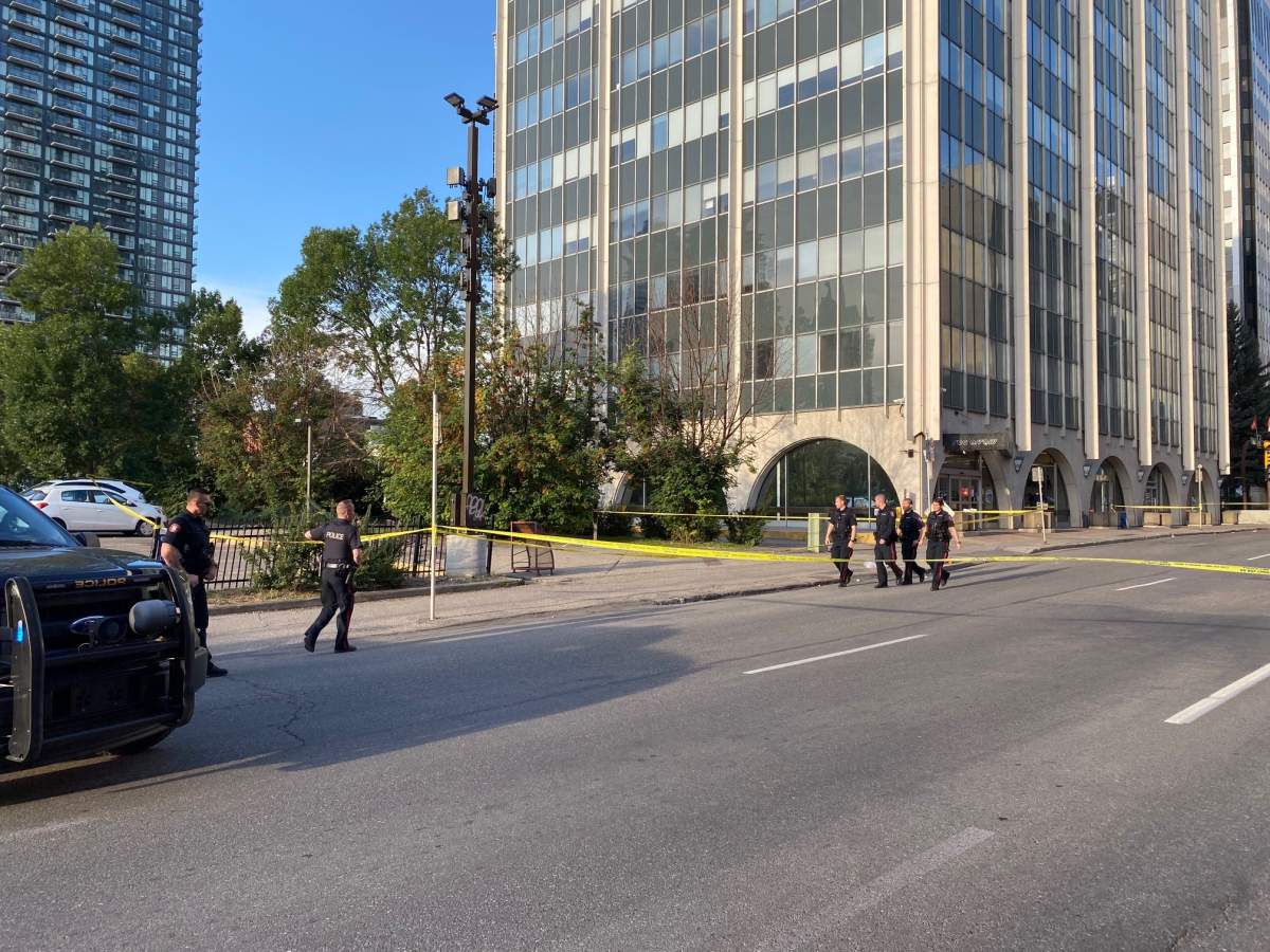 Calgary police taped off 9 Avenue SE between Centre Street and Macleod Trail after a man was hit on Monday, August 30, 2021.