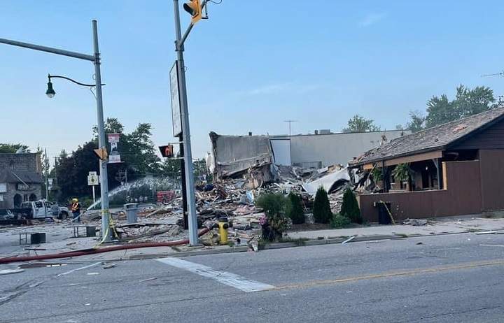 Damaged buildings can be seen in Wheatley, Ont.