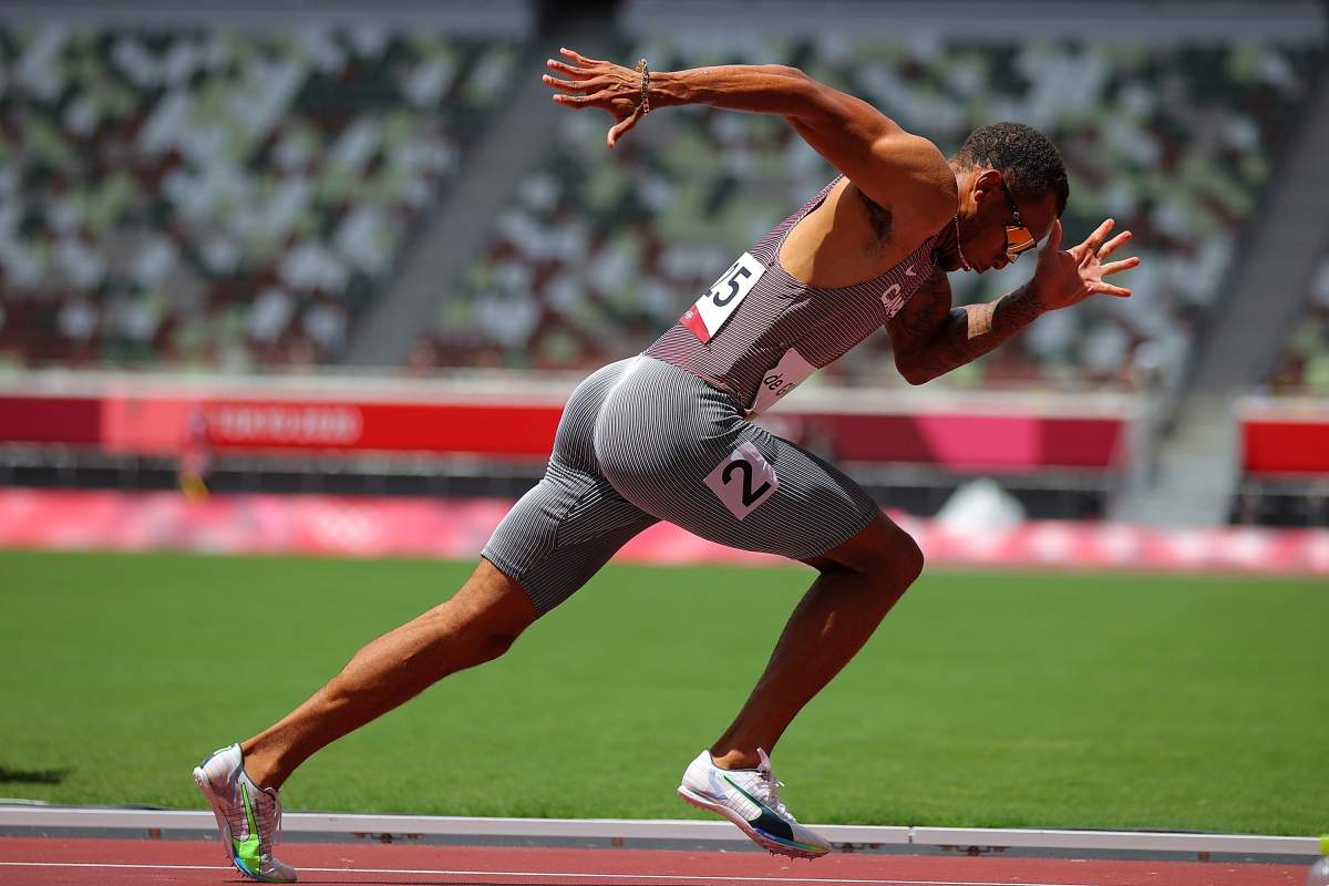 Andre de Grasse of Canada competes during the men's 200m heats at Tokyo 2020 Olympic Games, in Tokyo, Japan, Aug. 3, 2021. 