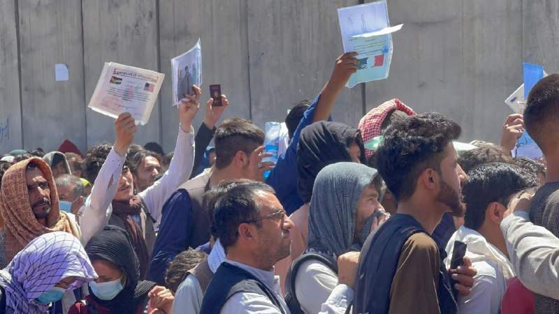 Afghan people who want to leave the country continue to wait around Hamid Karzai International Airport in Kabul, Afghanistan on Aug. 26, 2021.