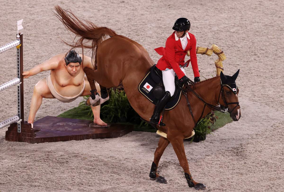 Daisuke Fukushima of Team Japan riding Chanyon clears the sumo wrestler jump during the Jumping Individual Final on day twelve of the Tokyo 2020 Olympic Games at Equestrian Park on August 04, 2021 in Tokyo, Japan. 