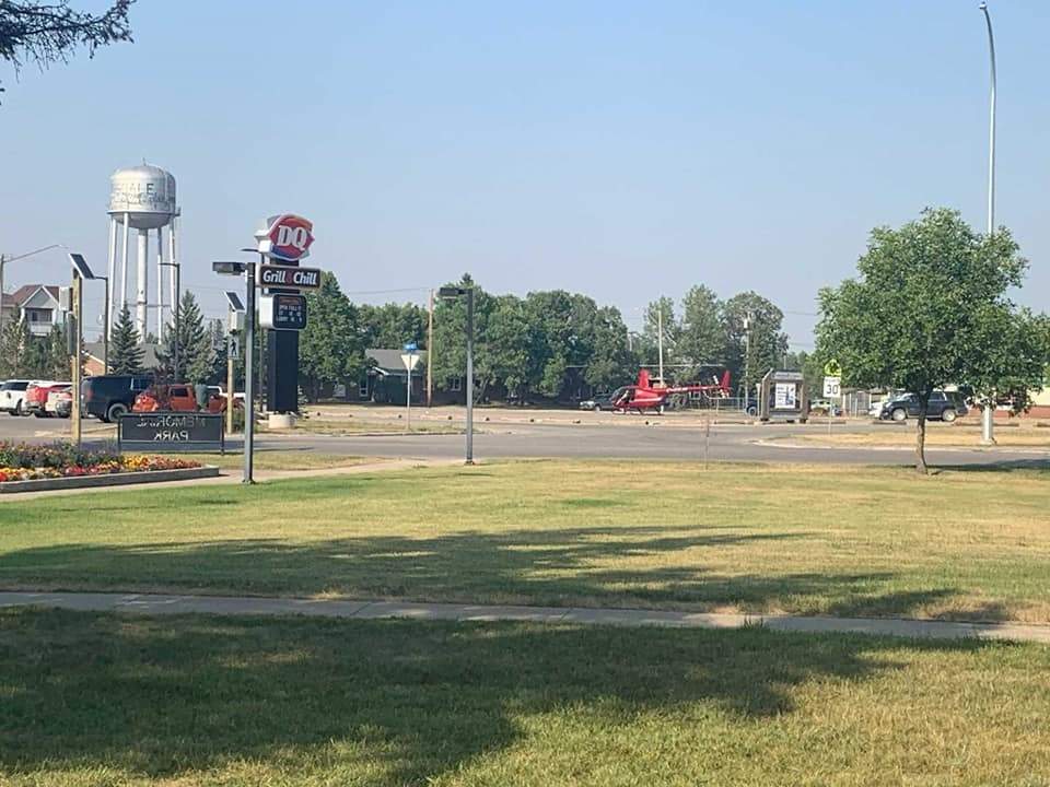 The helicopter landed in a high traffic parking lot in Tisdale, Sask., where a passenger then entered a Dairy Queen to purchase an ice cream cake, according to police.