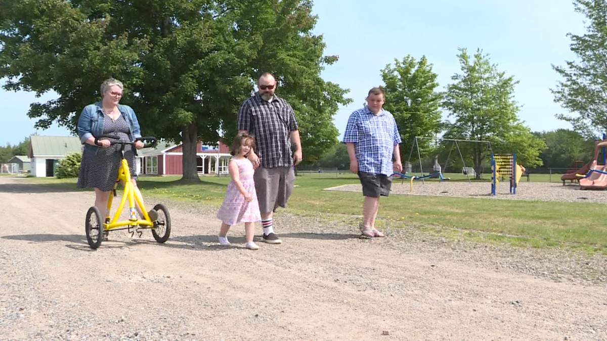 Katrina Kellough walks through Rotary Park with her family in Middleton, N.S.