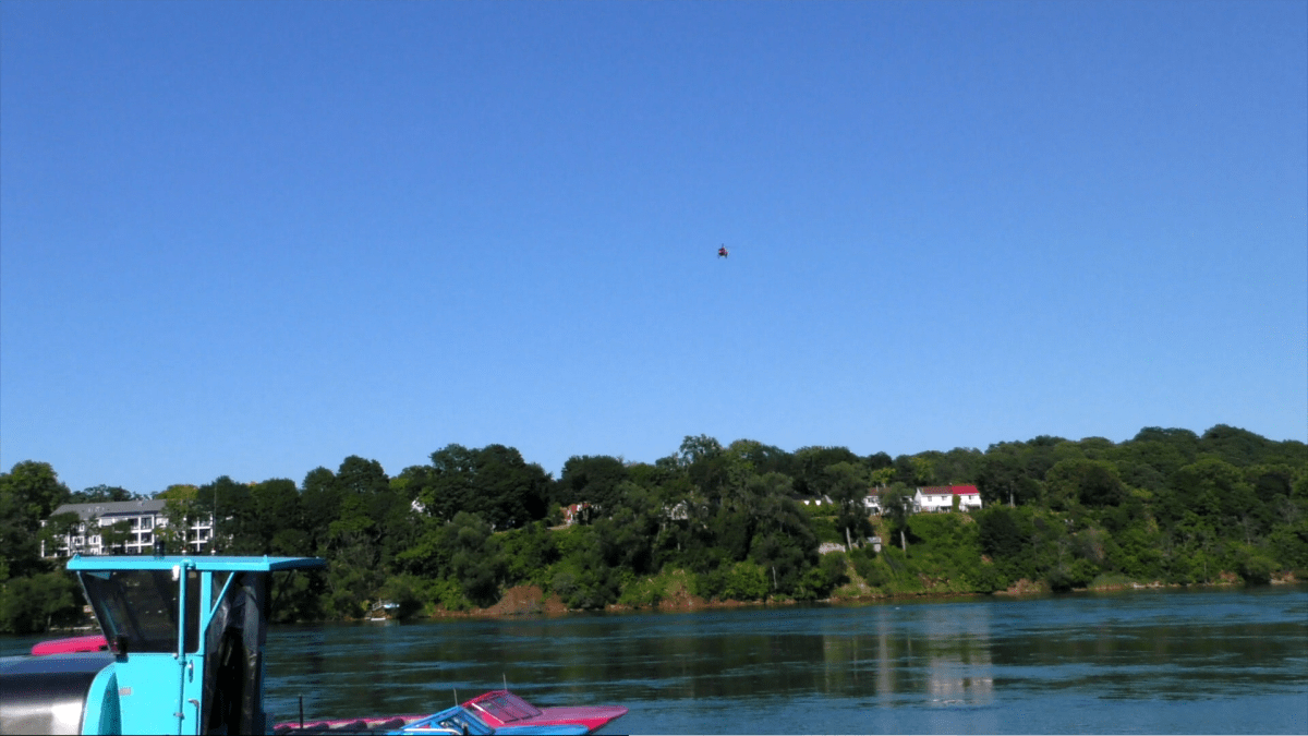 Emergency crews searching the Niagara River after a pair of Toronto residents went into the water on Aug. 1, 2021. Niagara Regional Police say a woman is dead and a man is missing after they went for a Sunday afternoon swim.