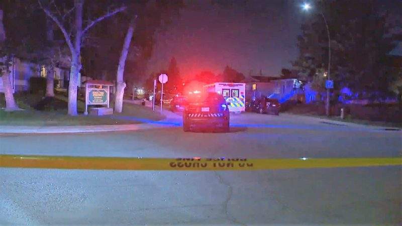 Calgary police investigate a shooting in the 2600 block of 16 Avenue Southeast on Thursday, Aug. 12, 2021.