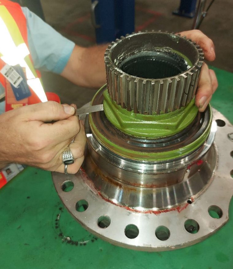 The green portion of the bolt on this axle bearing unit was loose, allowing for a small amount of movement that was enough to derail one axle on an Ottawa LRT vehicle from the track on Sunday evening, according to the city’s transit boss.
