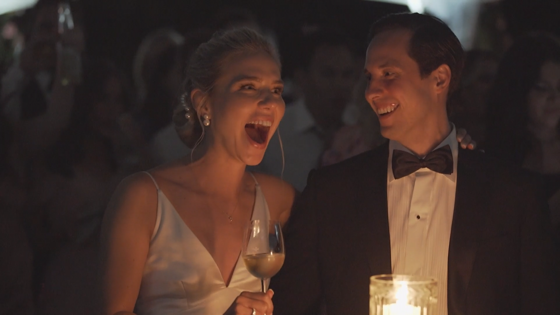 Brittany Smith Gallant and her new husband Jeff Gallant react to the hologram of her bridesmaid Sarah Redington appearing at their Niagara-on-the-Lake wedding.