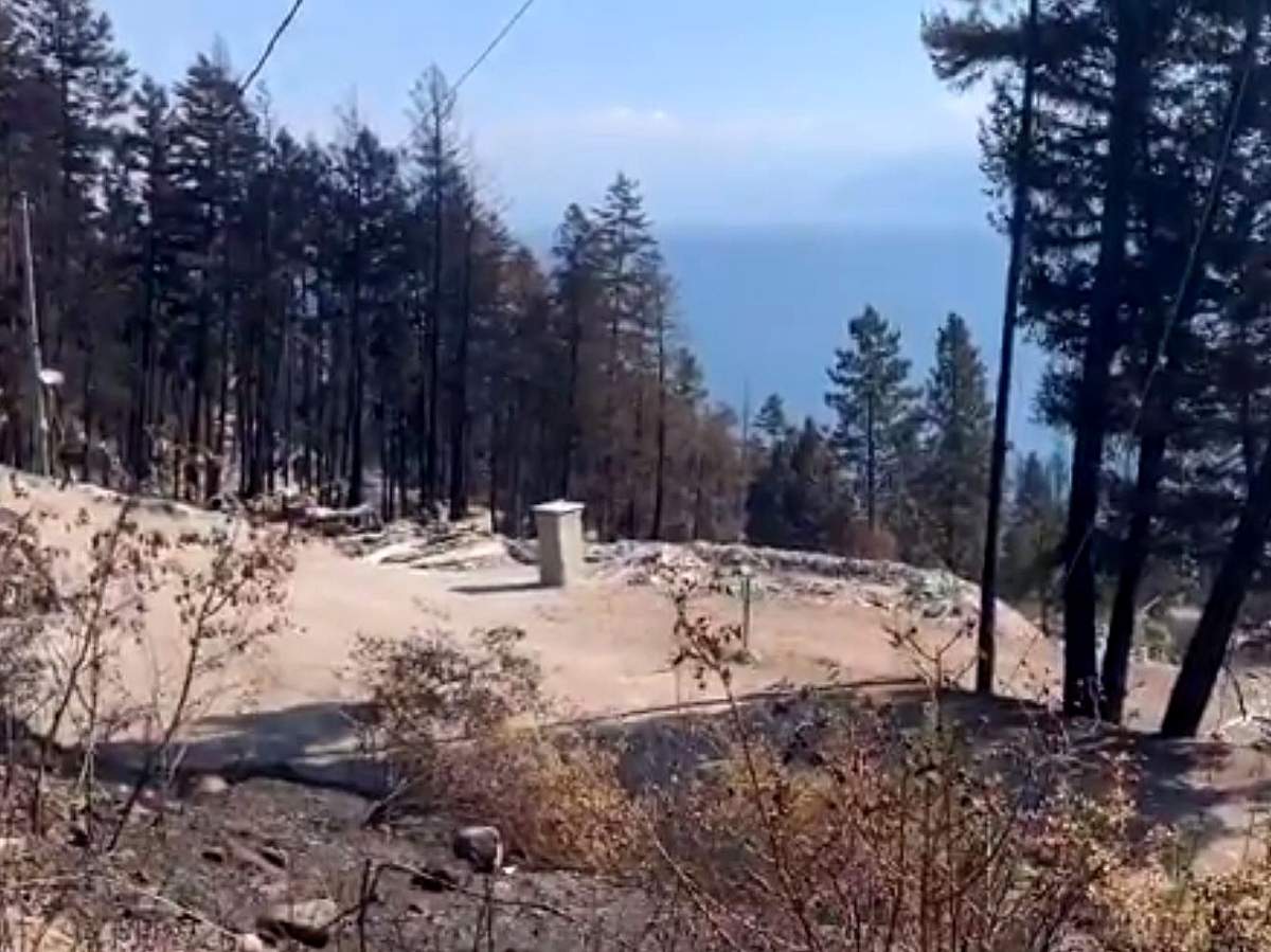 A view of a fire-damaged property near Westside Road in the Central Okanagan.