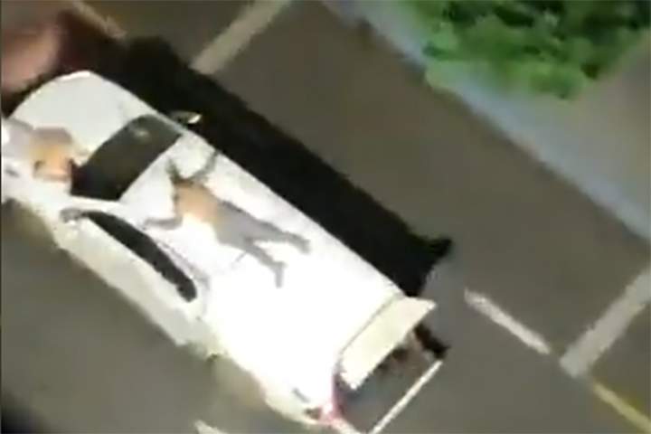 Hostages are shown on a getaway vehicle during a series of bank robberies in Aracatuba, Brazil on Aug. 30, 2021.