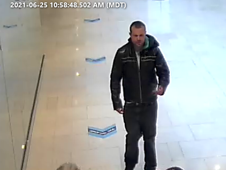 Calgary police are looking to identify a man believed to have attacked a woman in a hate-motivated assault downtown.