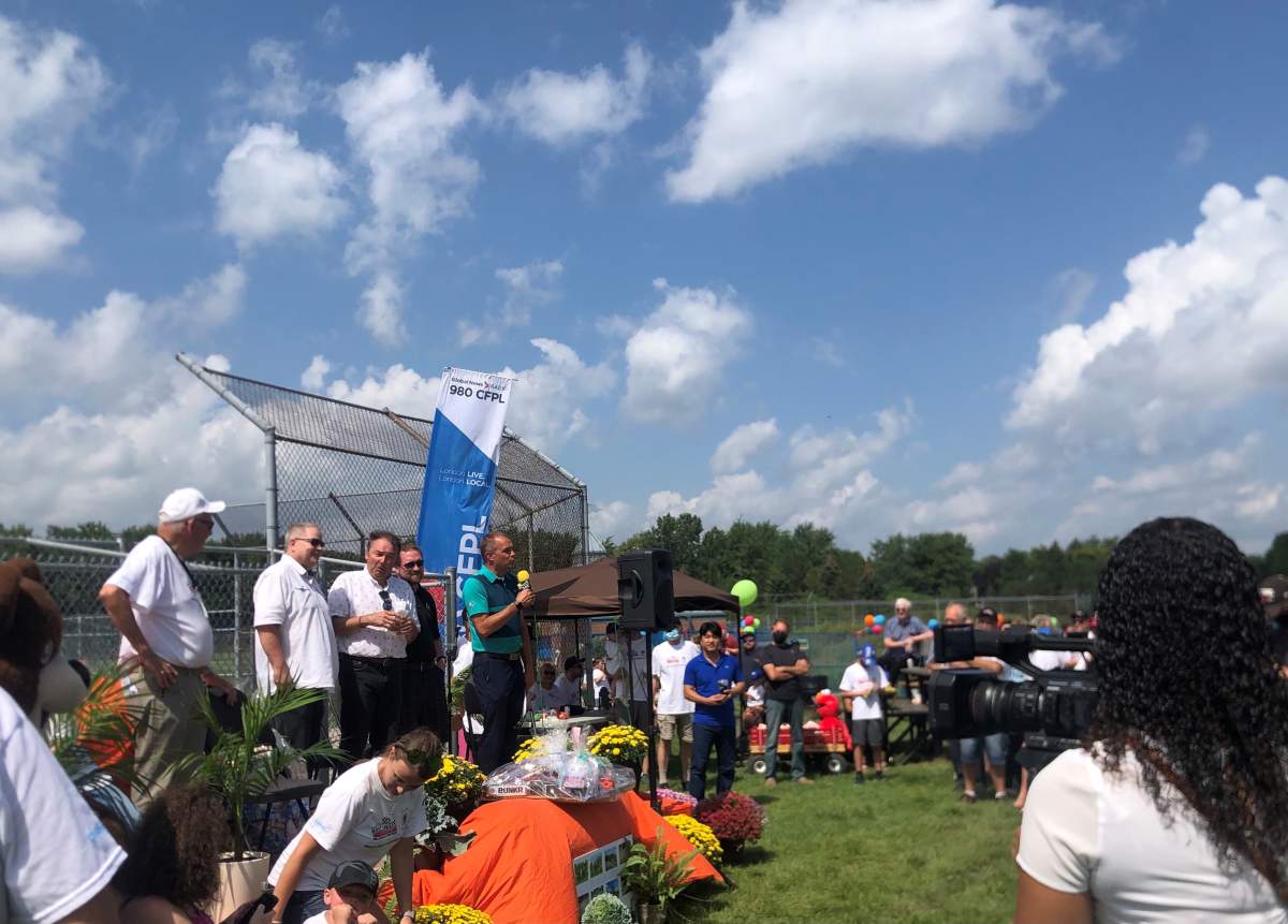 The playground's grand opening took place Sunday afternoon. Families were invited for pizza and ice cream, and children got to play on the new equipment after ribbon cutting. .