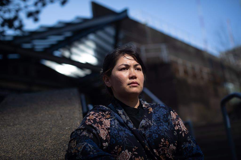 Friba Rezayee, who was one of Afghanistan's first two female Olympians in 2004, poses for a photograph in Vancouver, on Wednesday, September 1, 2021.