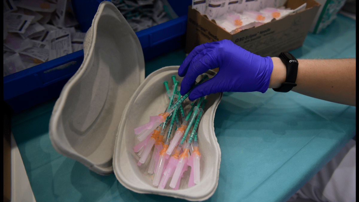 File photo, a health worker prepares Pfizer-BioNTech vaccines. (AP Photo/Alvaro Barrientos, File) .