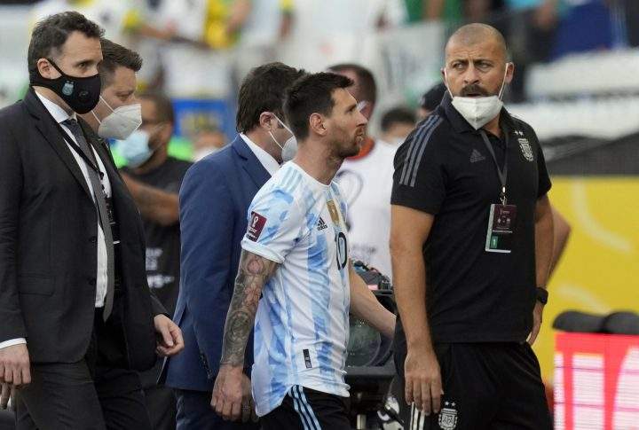 Argentina's Lionel Messi walks off the field after the qualifying soccer match for the FIFA World Cup Qatar 2022 against Brazil was interrupted by health officials in Sao Paulo, Brazil, Sunday, Sept. 5, 2021. 