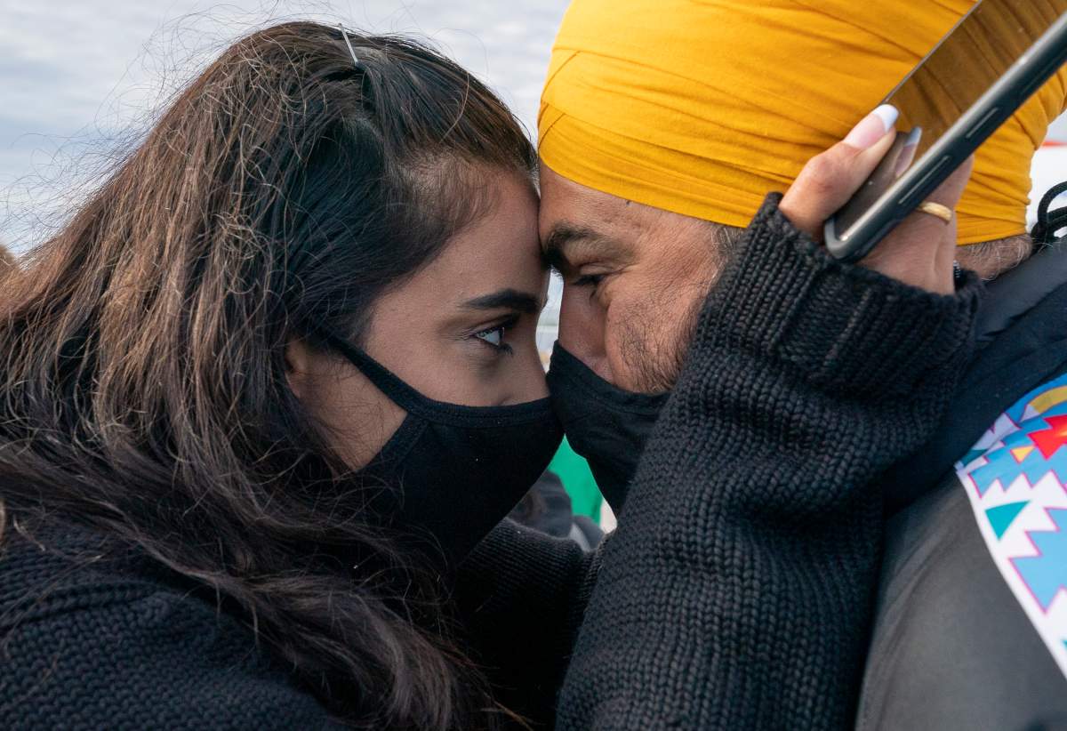 NDP leader Jagmeet Singh and his wife  Gurkiran Kaur share a moment together in Sioux Lookout, Ont., Monday, September 13, 2021.  