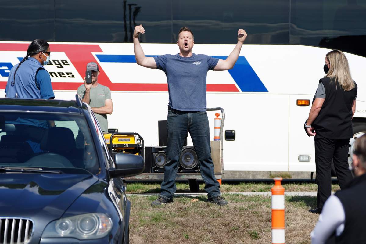 A protestor heckles Trudeau.