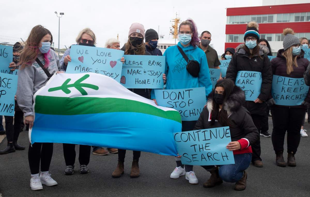 A demonstration is held at the Canadian Coast Guard station in St. John’s NL on Monday, September 20, 2021. The group were protesting against the suspension of a search by the Joint Rescue Coordination Centre, after just 48 hours, for two young fishers missing off the coast of Labrador. THE CANADIAN PRESS/Paul Daly.