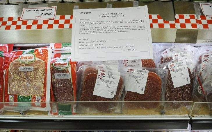 A sign at a Metro store is seen in Montreal Wednesday, Aug. 27, 2008, advising customers that Maple Leaf products found on their shelves are not part of the recall.